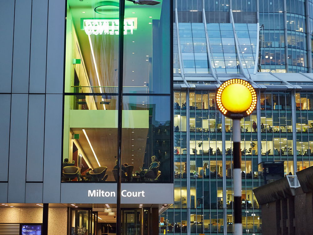 Front of Milton Court in the evening, with pelican crossing lamp in the shot